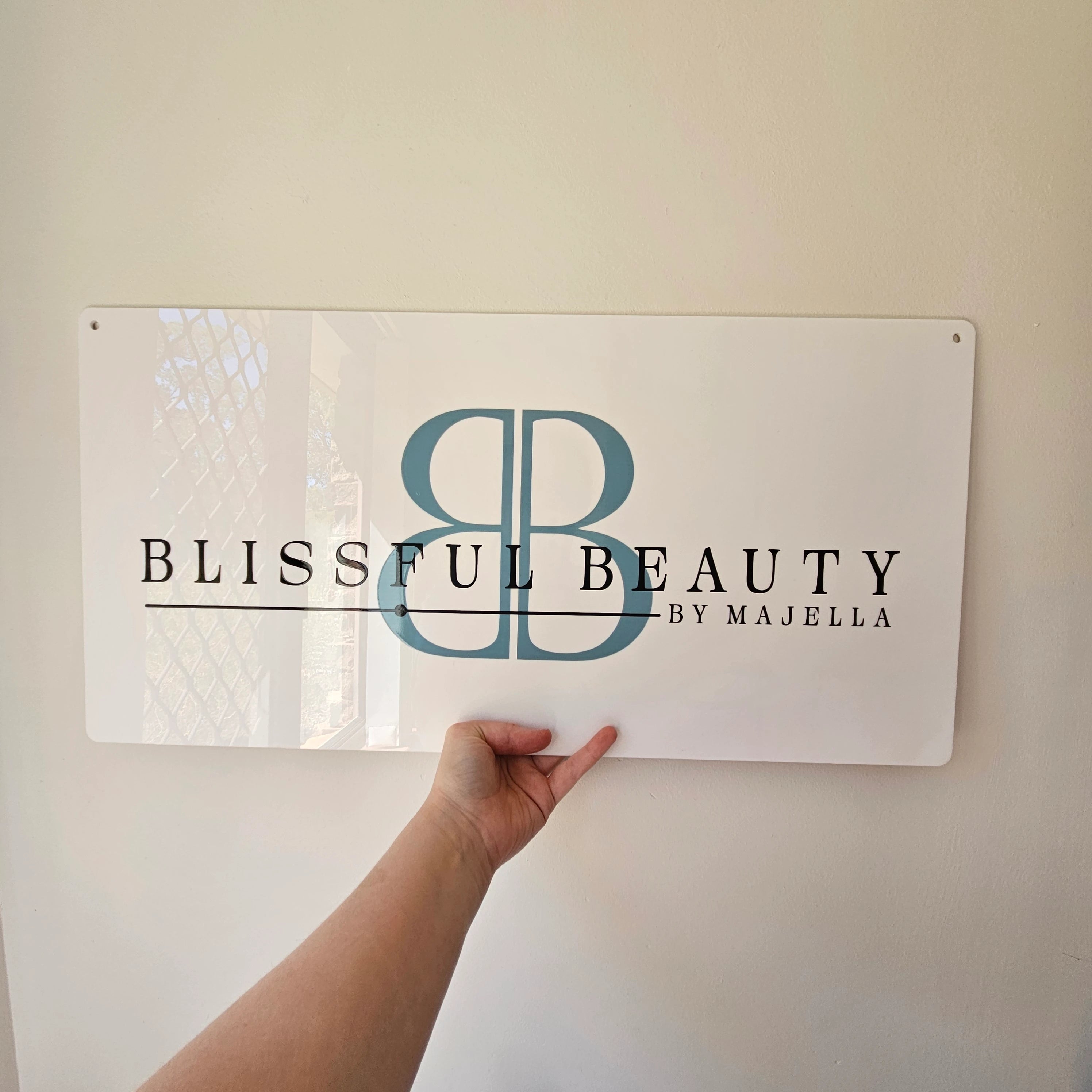 Gloss White acrylic business sign with UV printed logo