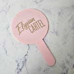 Round Custom Handheld Mirror with Gold Engraved Logo and Baby Pink Acrylic