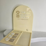 Custom Eftpos Holder in gloss cream with gold and white logos