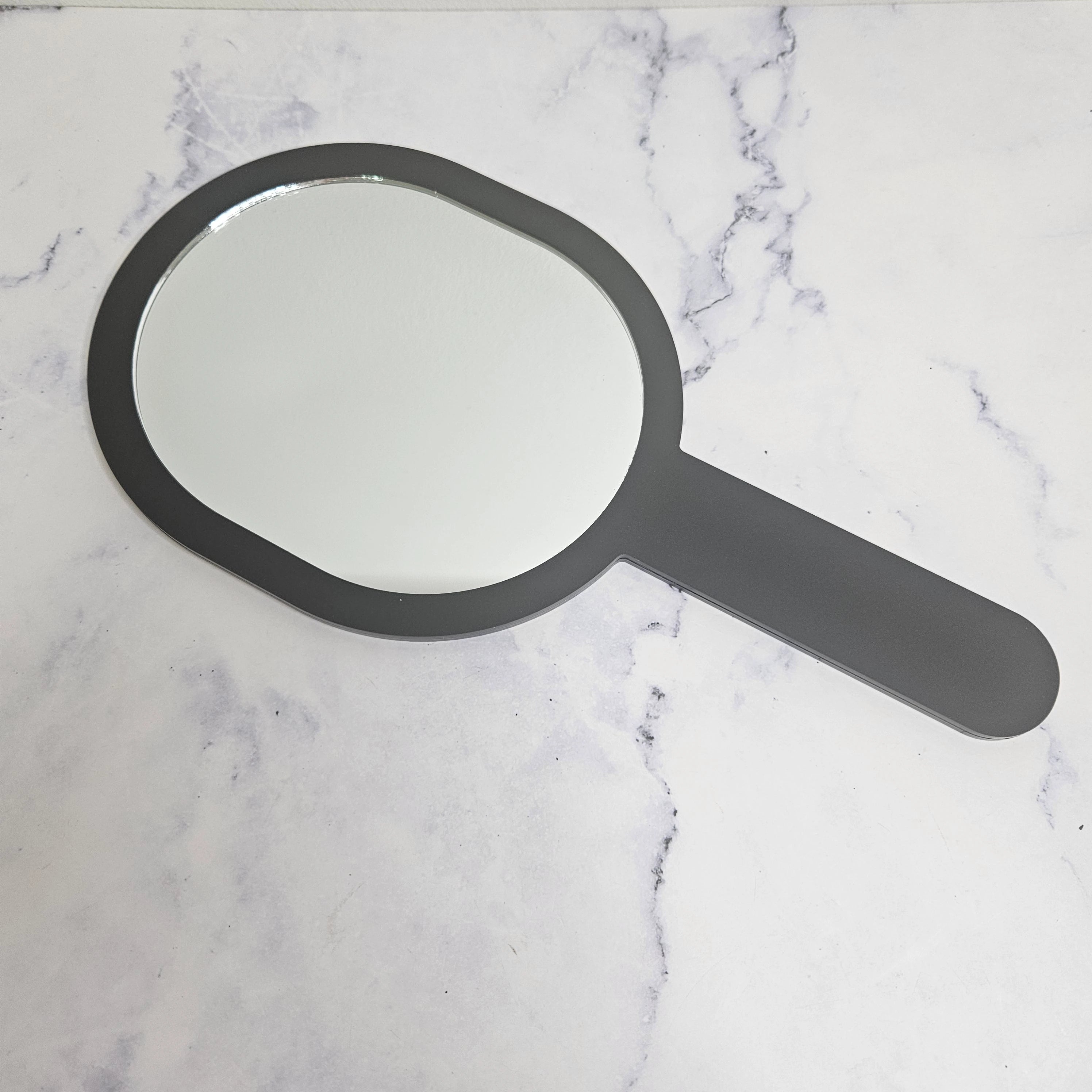 Oval Handheld Mirror with black acrylic