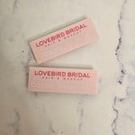 Name Badges in Pink with Red & White writing