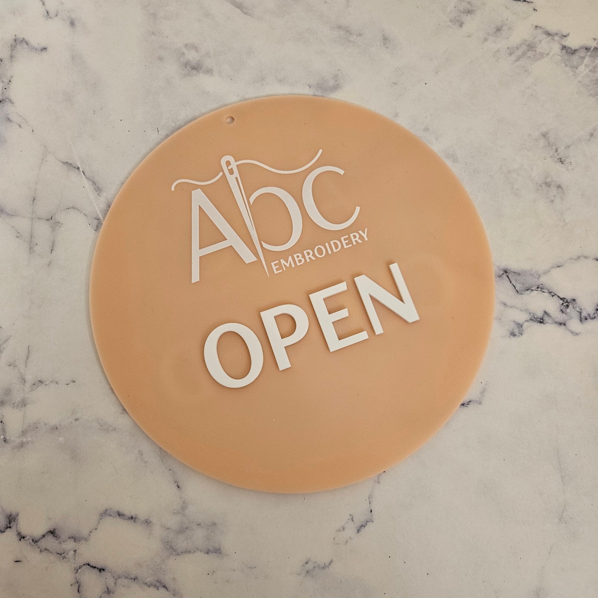 Round open sign with acrylic letters