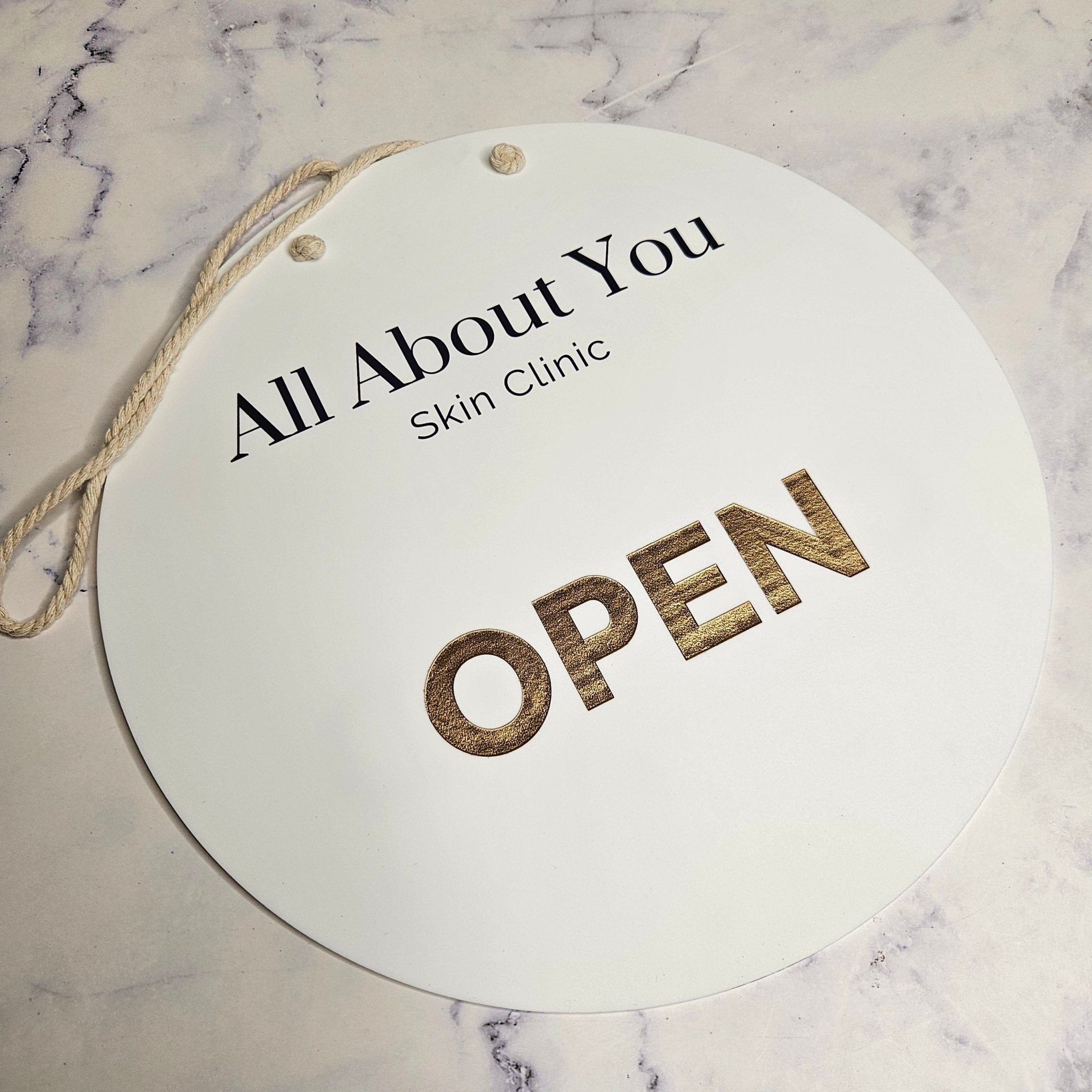 Open Signage with engraved gold letters