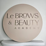 Round business sign (beige with brushed brown 3D letters)