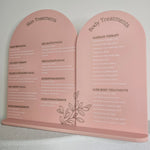 Double Arch treatment menu sign with gold engraving