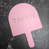 XL Arch Handheld Mirror in Pastel Pink Acrylic and Gold Logo