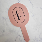 Oval handheld mirror in pink clay acrylic & custom logo colour