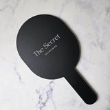 Black Oval handheld mirror with white logo