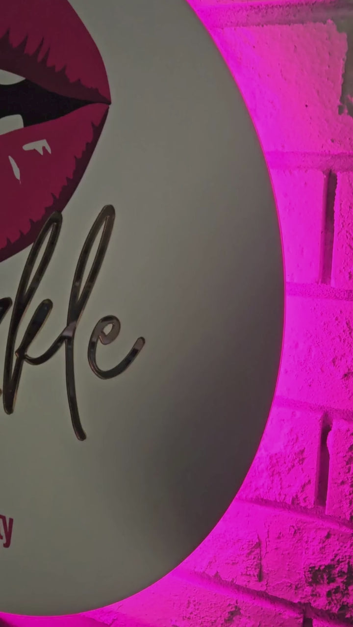 Custom Backlit Sign with pink lighting