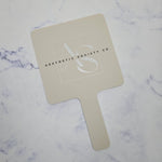 Square Handheld Mirror in Beige Acrylic & Black/White Logo